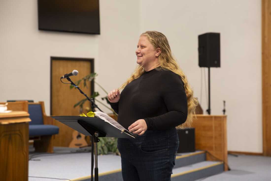 Music director Stephanie Helleckson, who has spent most of her life in Paonia, leads community choir practice at the church.