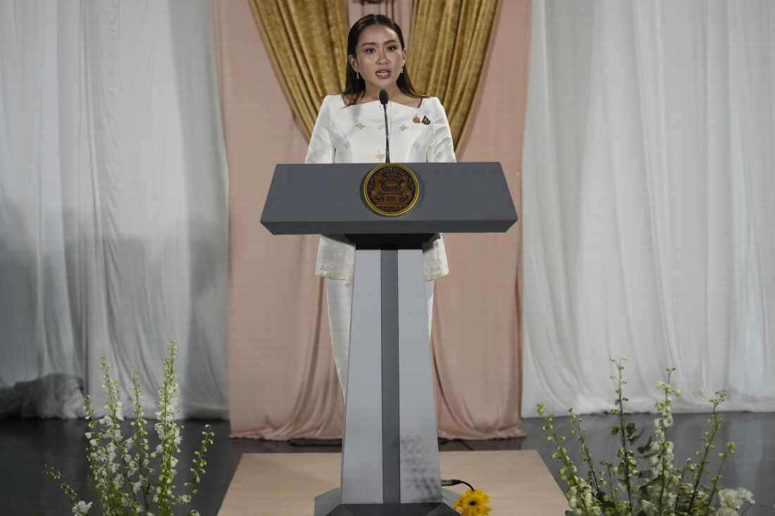 Thailand's new prime minister, Paetongtarn Shinawatra, talks to journalists after receiving a royal letter of endorsement for the post at the Pheu Thai party headquarters in Bangkok, Thailand, Aug. 18, 2024.