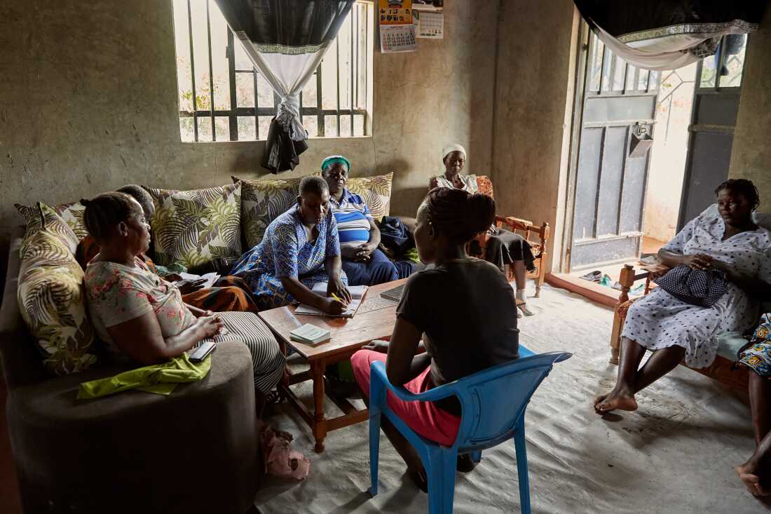 Table banking group at Justine's home, Nyang'ande, Kisumu, Kenya, 2025.