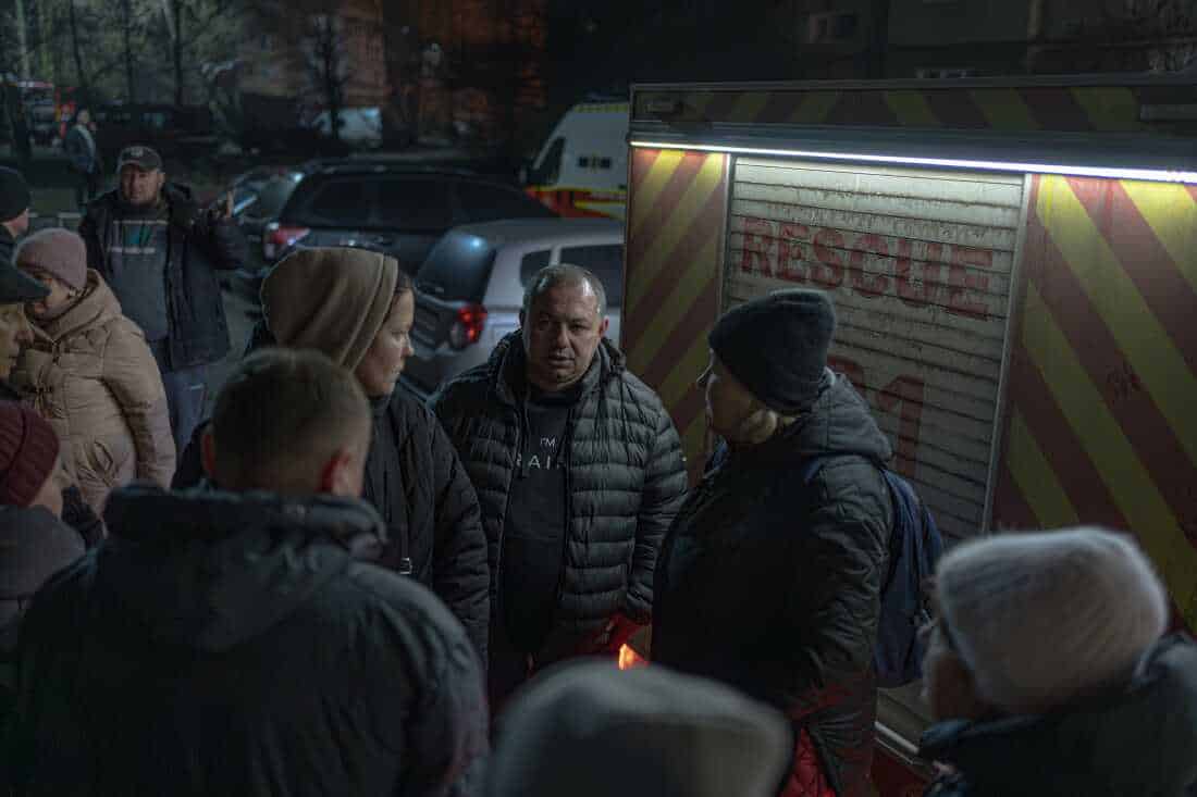 Artem Kobzar, major of Sumy city near damaged building talks to victims of strike on Jan. 30, 2025.