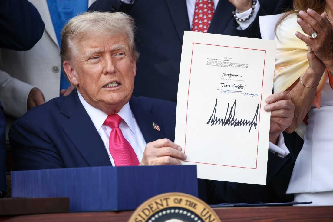 President Trump, joined by Republican lawmakers, signs the "One, Big Beautiful Bill Act," a massive spending and tax bill, at the South Lawn of the White House in Washington, D.C. on July 4, 2025.