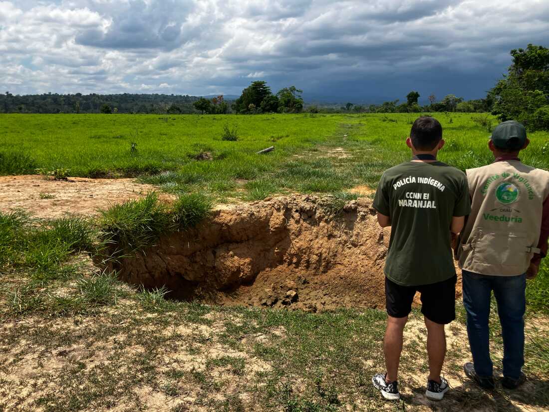 The local Indigenous Police watch over a once-busy clandestine airstrip, its surface scarred with deep holes dug by the Indigenous Ashaninka community to stop traffickers who once flew two to three cocaine-loaded planes a week to Bolivia.