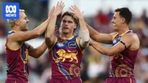 Will Ashcroft celebrates a goal for the Brisbane Lions during the round 18 match at the Gabba